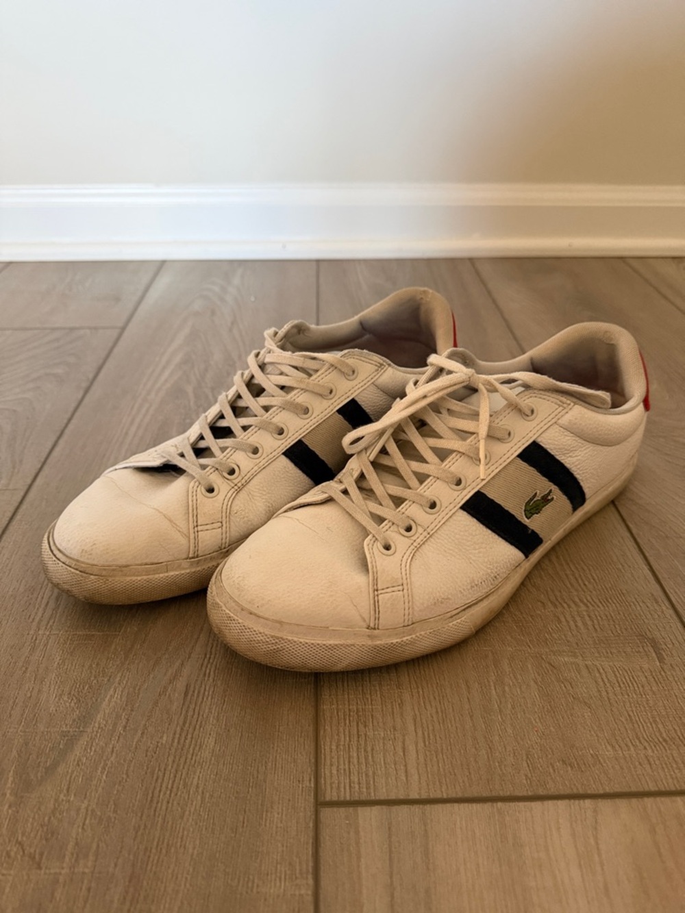 Lacoste Cream Leather Sneakers with Black Stripe